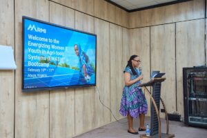 Woman presenting at RMI conference.