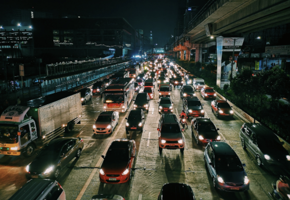 Cars driving in the city at night